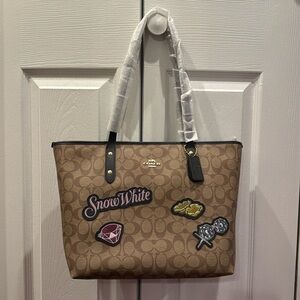 COACH X DISNEY SNOW WHITE CITY ZIP TOTE IN SIGNATURE CANVAS